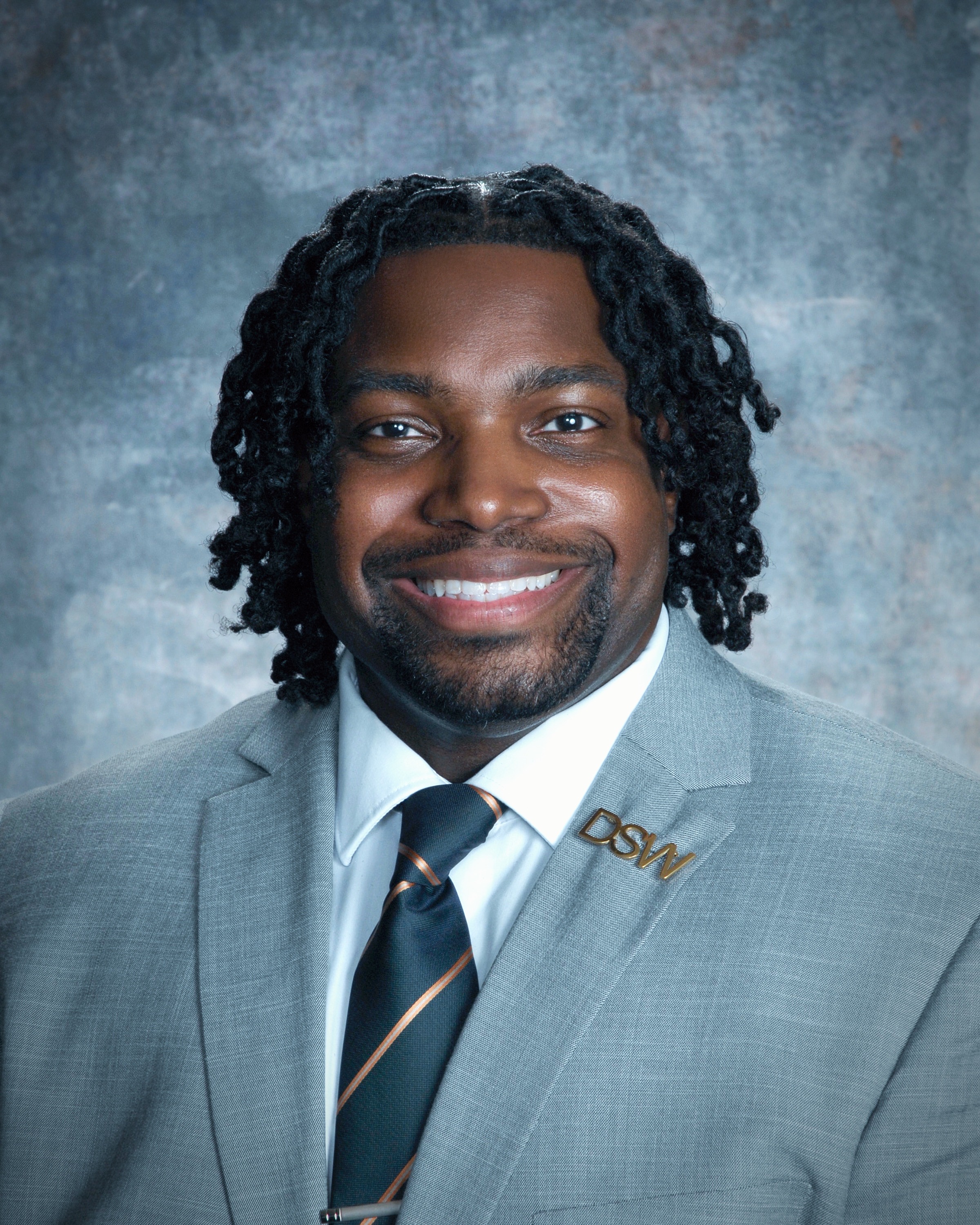 Headshot of Dr. Justin T. Guy